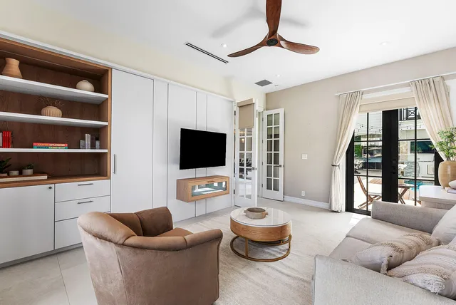 a room with furniture and a flat screen tv