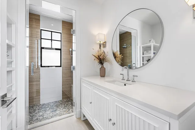 a bathroom with a shower and a tub
