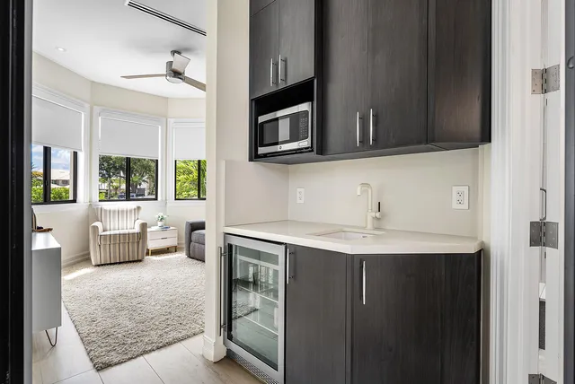 a view of roof deck with seating space and hardwood floor