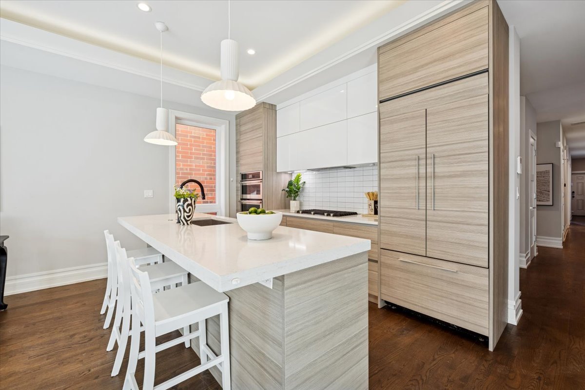 1448 West Chestnut Street, Unit 3 Chicago, IL 60642 - Photo 11 of 46 a kitchen with a table and chairs