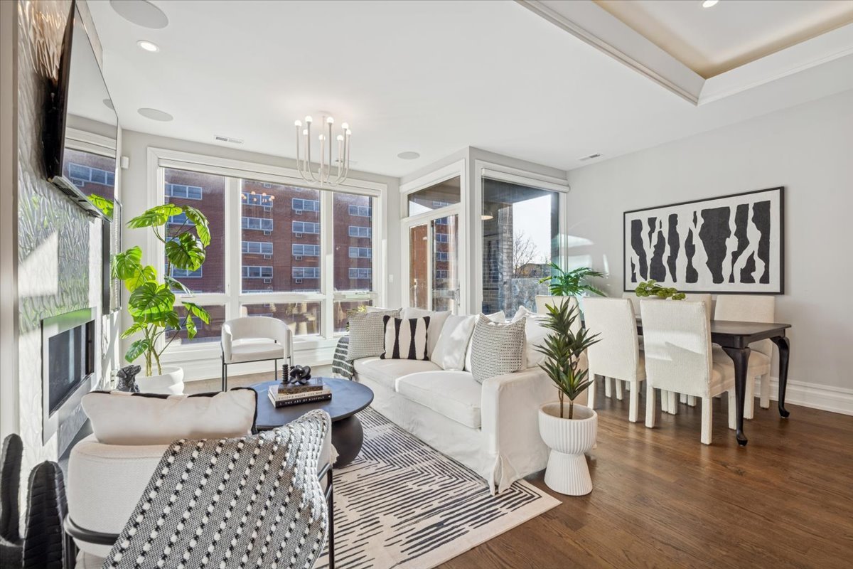 1448 West Chestnut Street, Unit 3 Chicago, IL 60642 - Photo 3 of 46 a living room with furniture and a table
