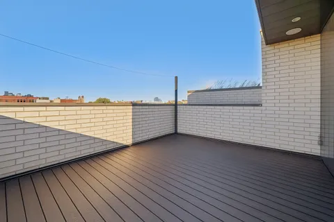 a view of a balcony with an ocean view
