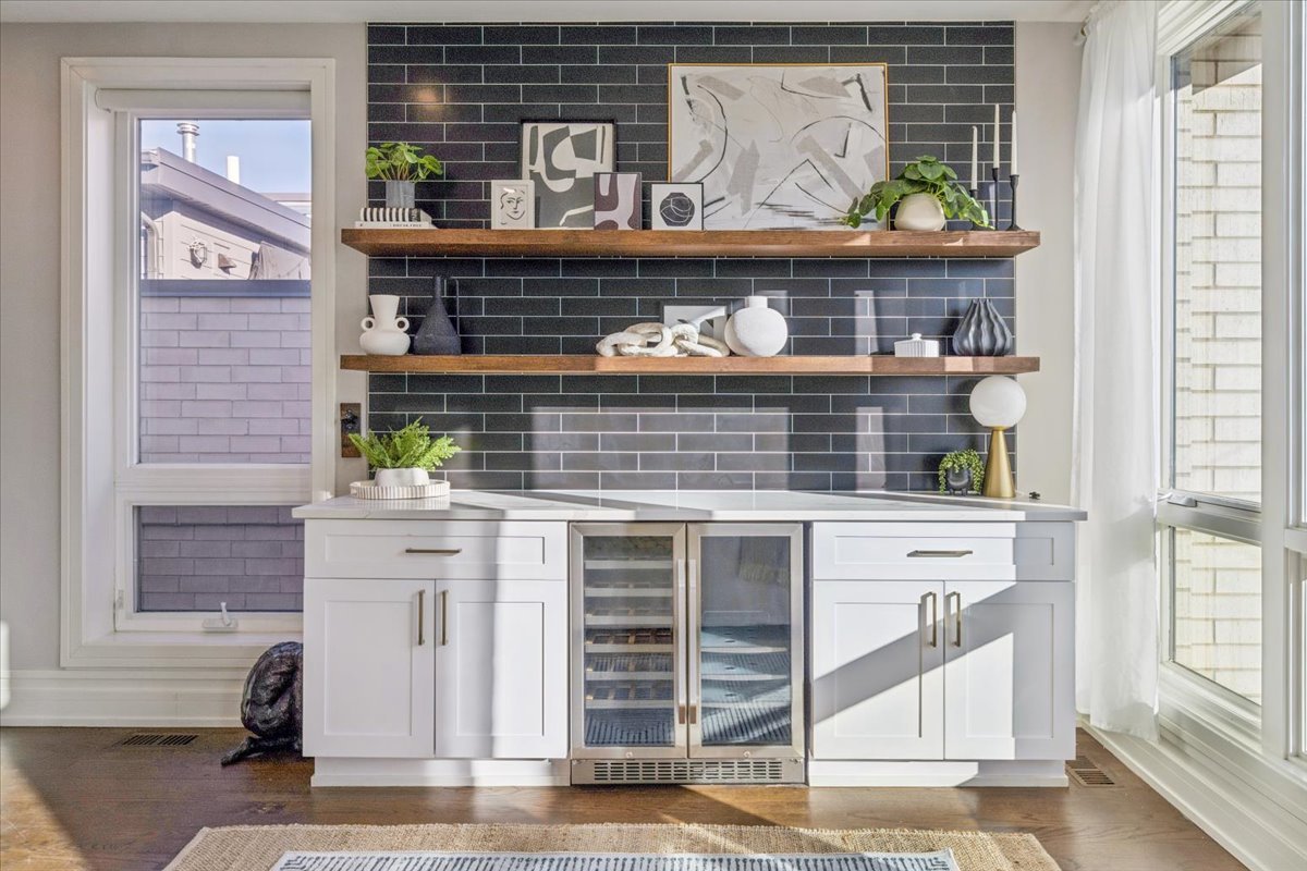 1448 West Chestnut Street, Unit 3 Chicago, IL 60642 - Photo 38 of 46 a kitchen with stainless steel appliances kitchen island granite countertop a stove and cabinets