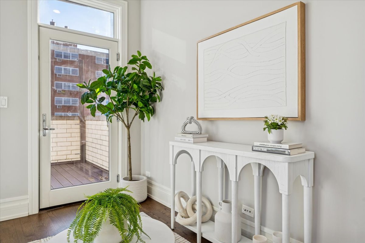 1448 West Chestnut Street, Unit 3 Chicago, IL 60642 - Photo 41 of 46 a view of entryway with a flower pot