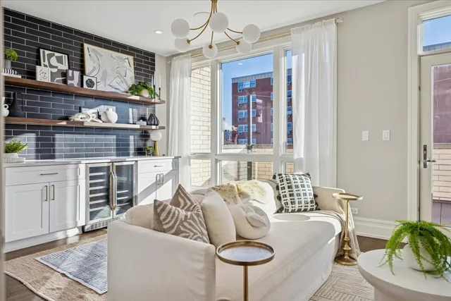 a view of a balcony with wooden floor and fence