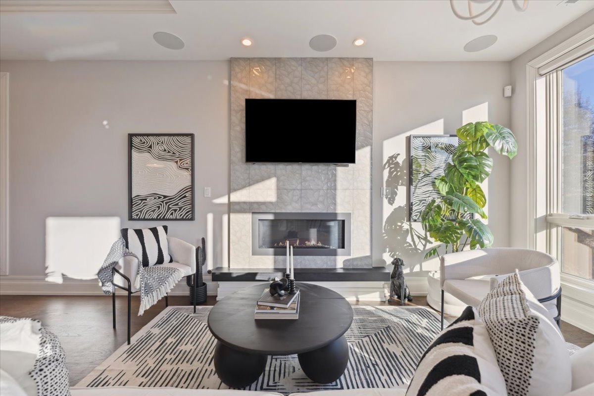 1448 West Chestnut Street, Unit 3 Chicago, IL 60642 - Photo 6 of 46 a living room with furniture fireplace and a flat screen tv