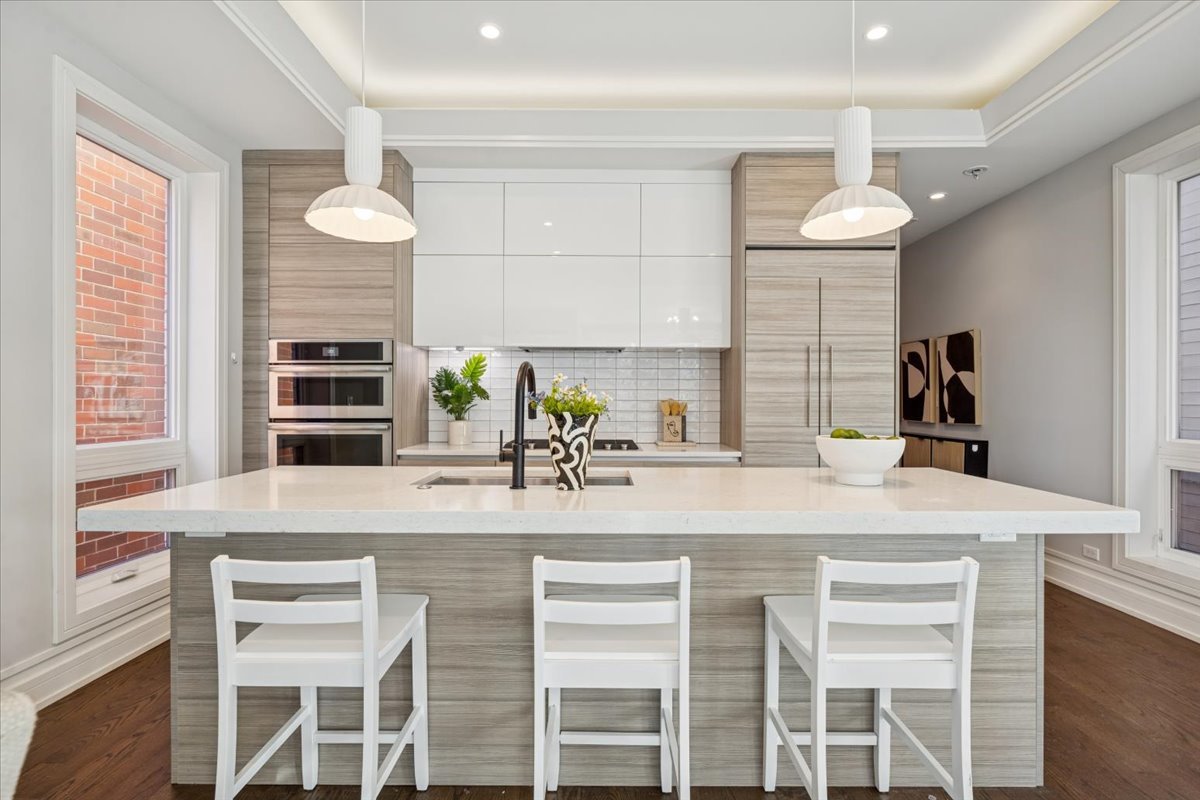 1448 West Chestnut Street, Unit 3 Chicago, IL 60642 - Photo 10 of 46 a kitchen with a table and chairs in it