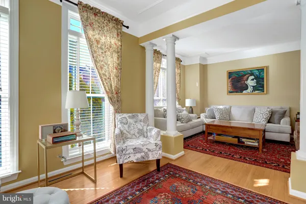 a living room with furniture fireplace and a flat screen tv