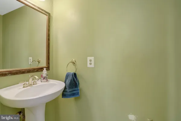 a living room with a window and a table