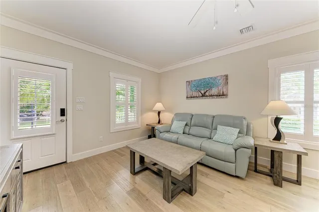 a living room with furniture and a window