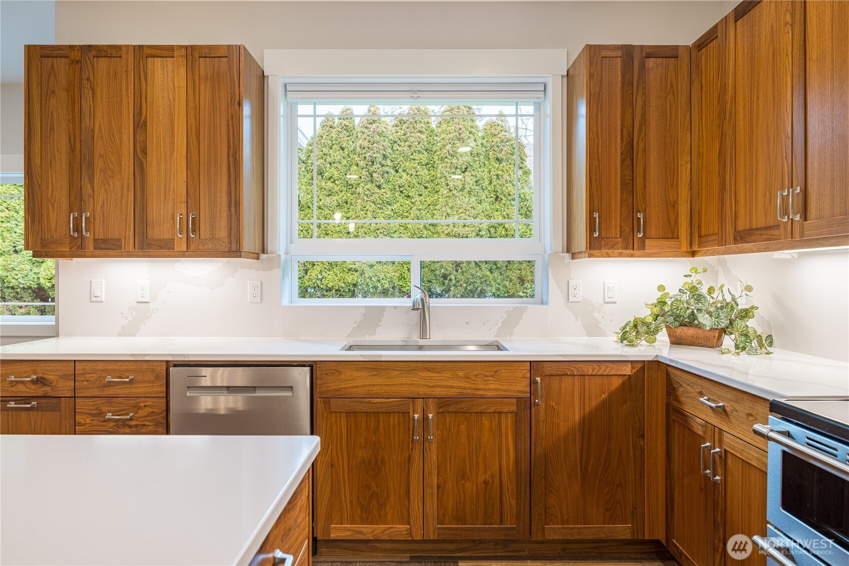 127 Sunrise View Avenue Sequim, WA 98382 - Photo 12 of 31 a kitchen with a sink and cabinets