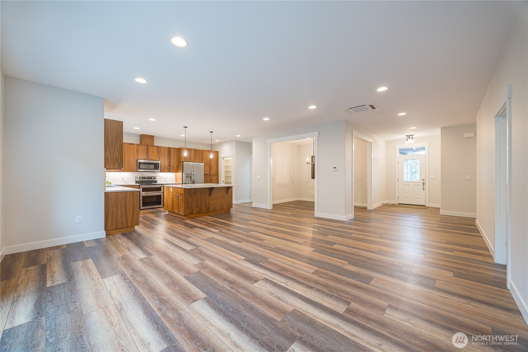 127 Sunrise View Avenue Sequim, WA 98382 - Photo 15 of 31 a view of a kitchen with kitchen island and stainless steel appliances