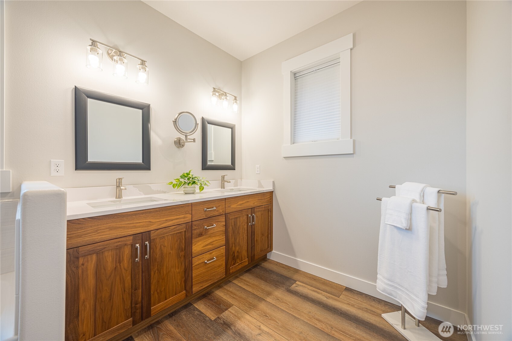 127 Sunrise View Avenue Sequim, WA 98382 - Photo 21 of 31 a spacious bathroom with a double vanity sink and a mirror