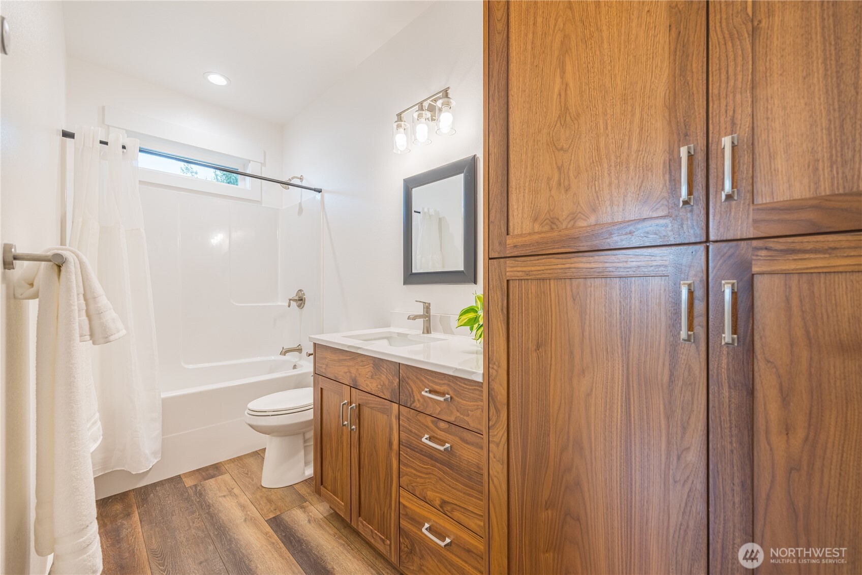 127 Sunrise View Avenue Sequim, WA 98382 - Photo 23 of 31 a bathroom with a granite countertop sink toilet and shower
