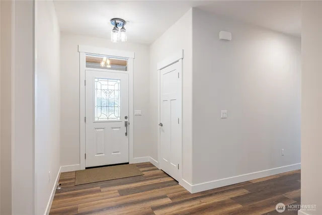 a view of a livingroom from a hallway