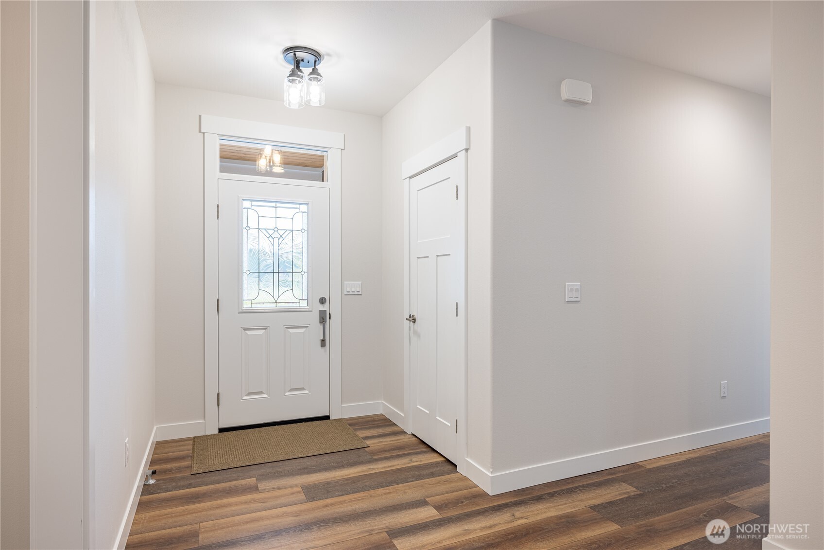 127 Sunrise View Avenue Sequim, WA 98382 - Photo 4 of 31 a view of a livingroom from a hallway