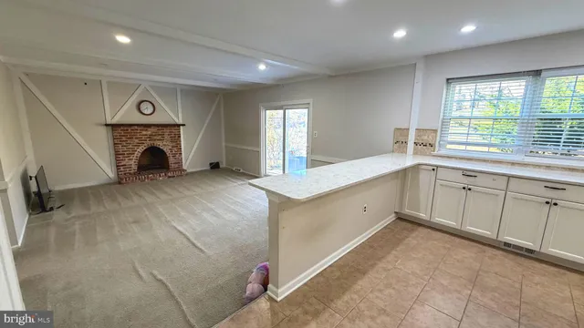 a view of an empty room and window