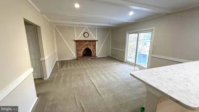 a view of a livingroom with a fireplace