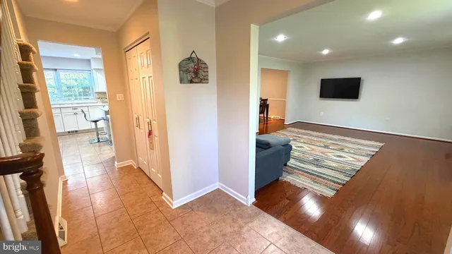 a view of a living room and a flat screen tv