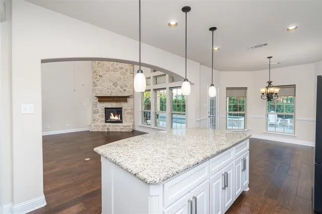 an aerial view of a house with a garden