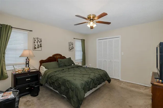 a bathroom with a granite countertop sink mirror and double