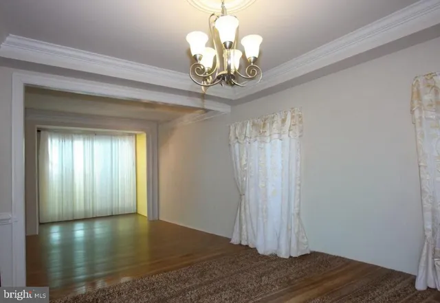 a view of a chandelier in a room