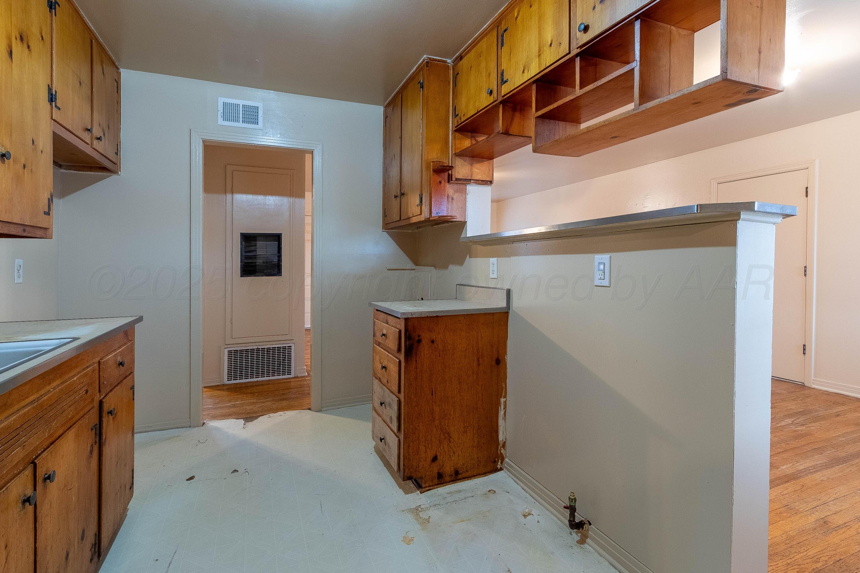 2414 Orange Street Amarillo, TX 79107 - Photo 5 of 16 a view of storage and utility room