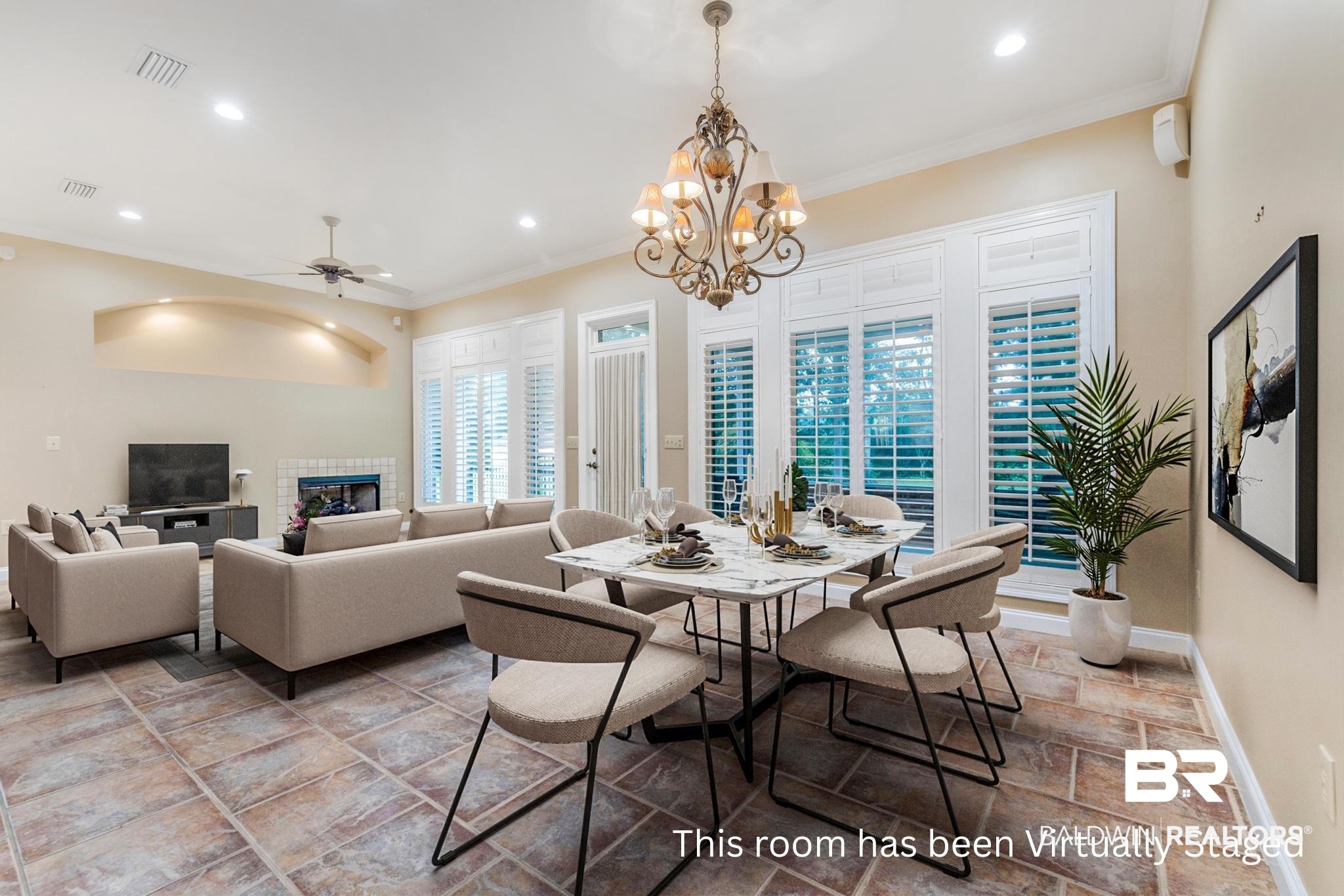 13612 Rue Royal Lane Silverhill, AL 36576 - Photo 10 of 65 Dining space featuring crown molding, recessed lighting, ceiling fan, a chandelier, and stone tile flooring