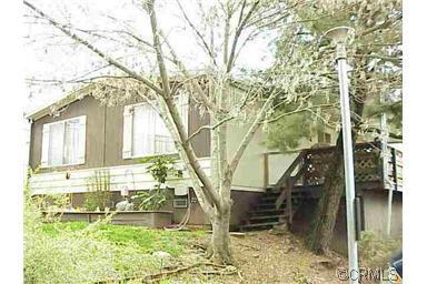 150 Clinton Road, Unit 26 Jackson, CA 95642 - Photo 1 of 5 a house view with a garden space