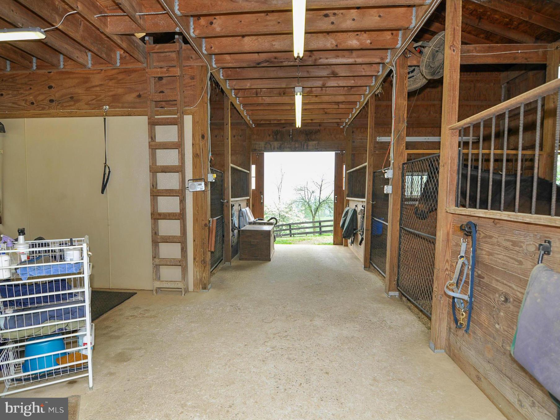 19971 Ridgeside Road Bluemont, VA 20135 - Photo 18 of 30 Concrete barn aisle