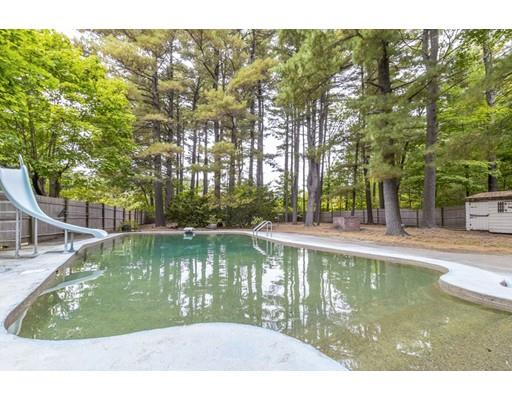 58 Oakvale Road Framingham, MA 01701 - Photo 26 of 30 a view of a wooden deck with a yard