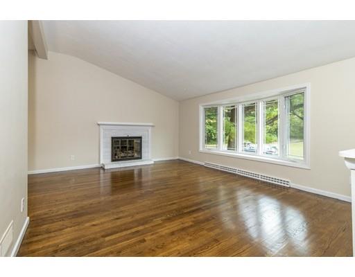 58 Oakvale Road Framingham, MA 01701 - Photo 4 of 30 a view of an empty room with wooden floor and a window