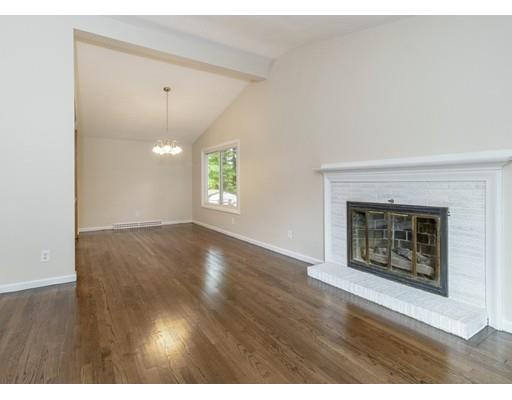 58 Oakvale Road Framingham, MA 01701 - Photo 5 of 30 an empty room with windows and fireplace