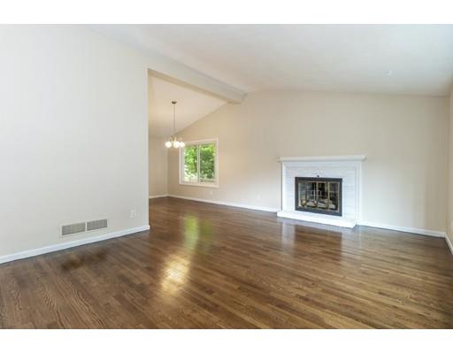 58 Oakvale Road Framingham, MA 01701 - Photo 6 of 30 a view of an empty room with a window and wooden floor