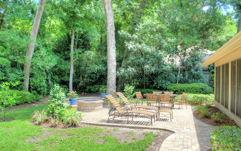 10 Willow Pond Road Fernandina Beach, FL 32034 - Photo 12 of 24 a view of a chair and tables in the garden