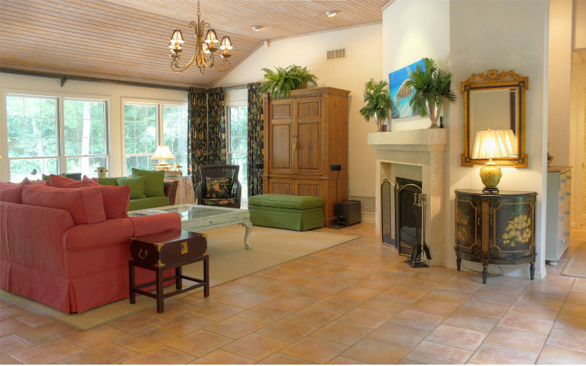 10 Willow Pond Road Fernandina Beach, FL 32034 - Photo 6 of 24 a living room with furniture a fireplace and a chandelier