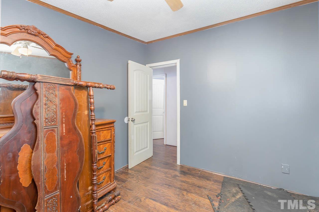 1339 Wiley Road Spring Hope, NC 27882 - Photo 15 of 22 a view of walk in closet
