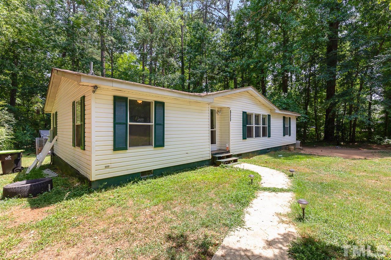 1339 Wiley Road Spring Hope, NC 27882 - Photo 2 of 22 a view of a house with a yard