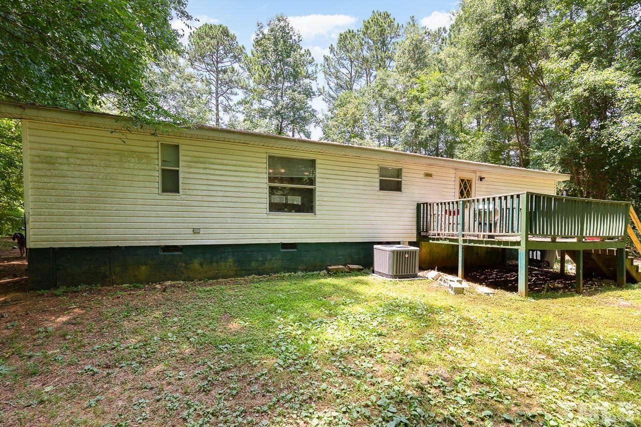1339 Wiley Road Spring Hope, NC 27882 - Photo 21 of 22 a view of a house with a yard