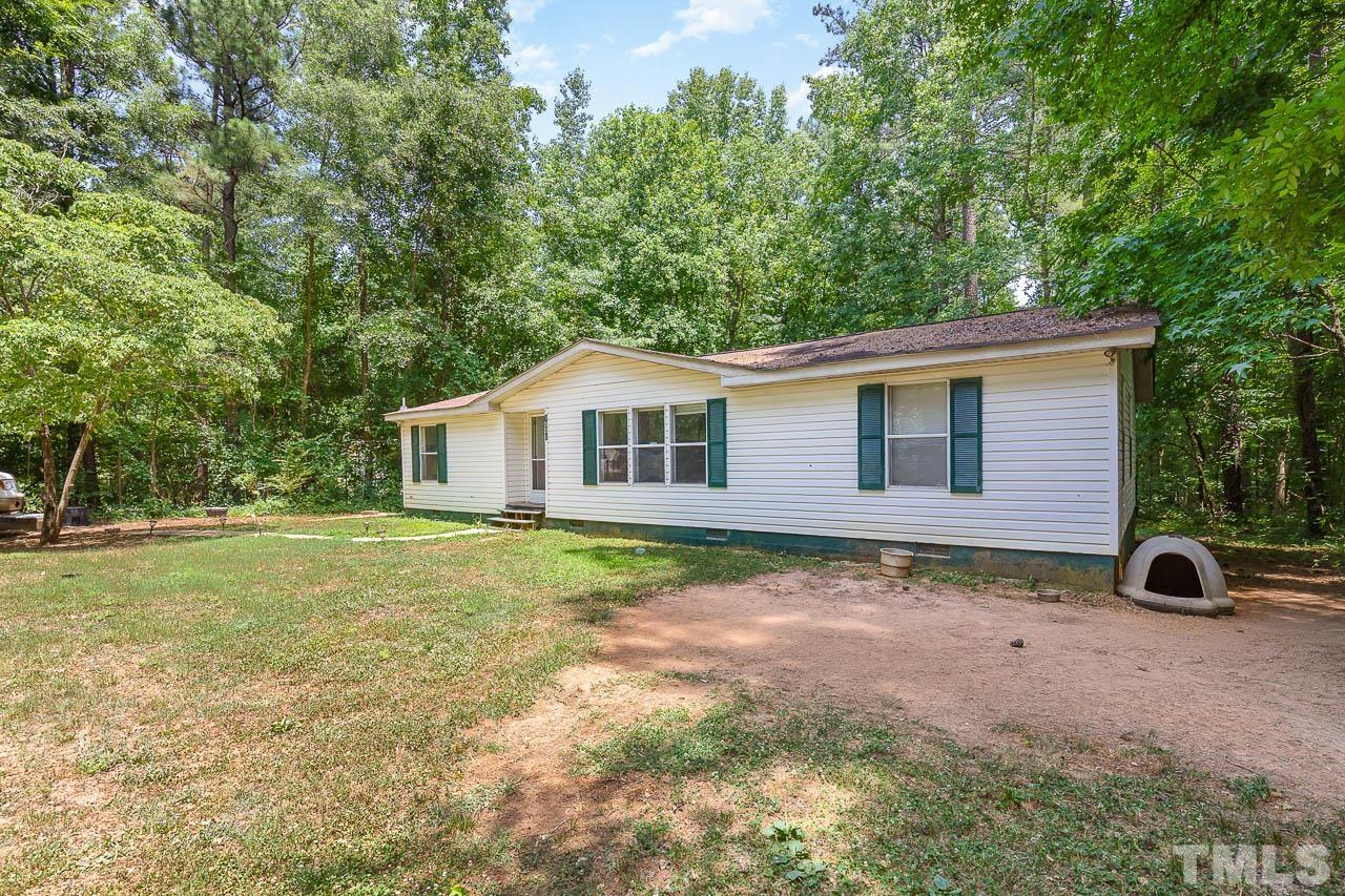 1339 Wiley Road Spring Hope, NC 27882 - Photo 3 of 22 a view of a house with backyard