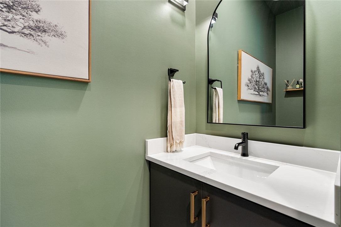 101 Casselberry Court Anderson, SC 29621 - Photo 20 of 48 This bathroom features a contemporary vanity with a sleek faucet and a stylish mirror.