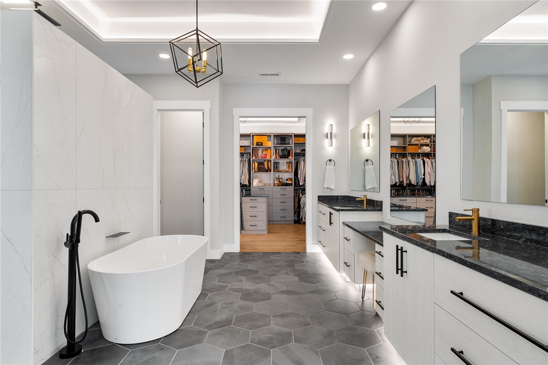 101 Casselberry Court Anderson, SC 29621 - Photo 23 of 48 This spacious bathroom offers a relaxing retreat with direct access to a well-organized closet.