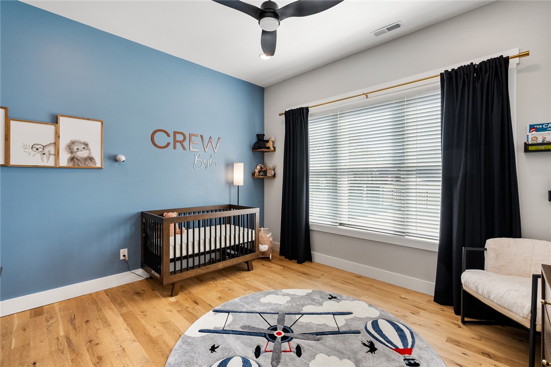 101 Casselberry Court Anderson, SC 29621 - Photo 28 of 48 This serene bedroom offers a bright and inviting space with warm hardwood floors.