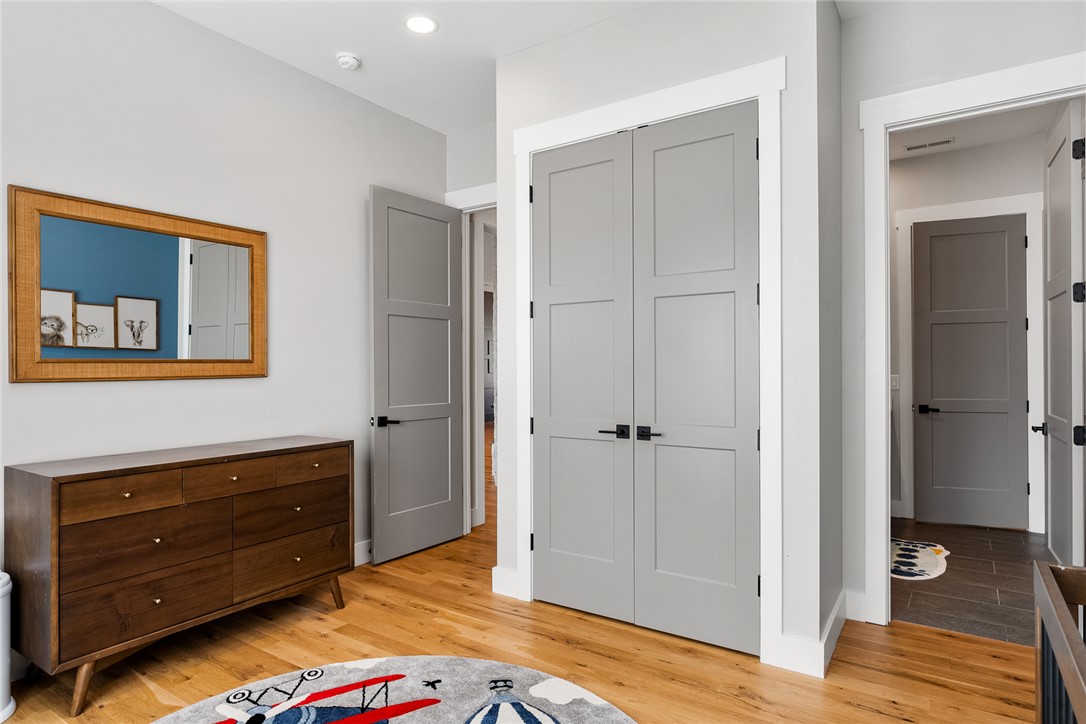 101 Casselberry Court Anderson, SC 29621 - Photo 29 of 48 This spacious bedroom features sleek panel doors and warm wood flooring.