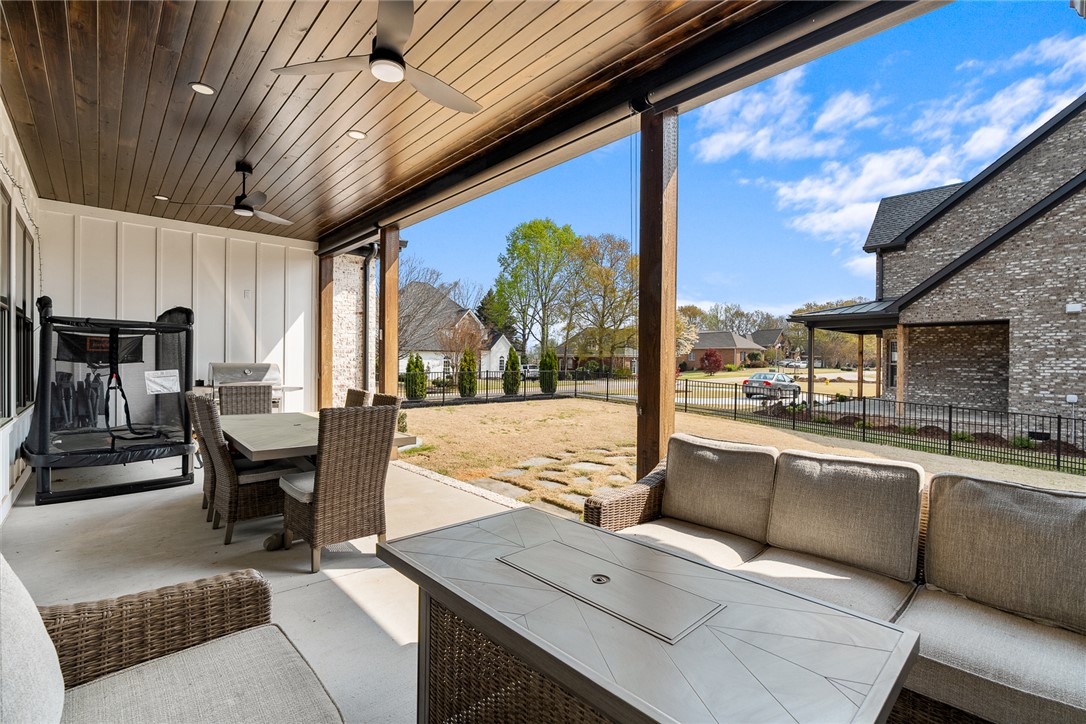 101 Casselberry Court Anderson, SC 29621 - Photo 38 of 48 Enjoy outdoor living on this expansive covered patio, perfect for relaxation and gatherings.