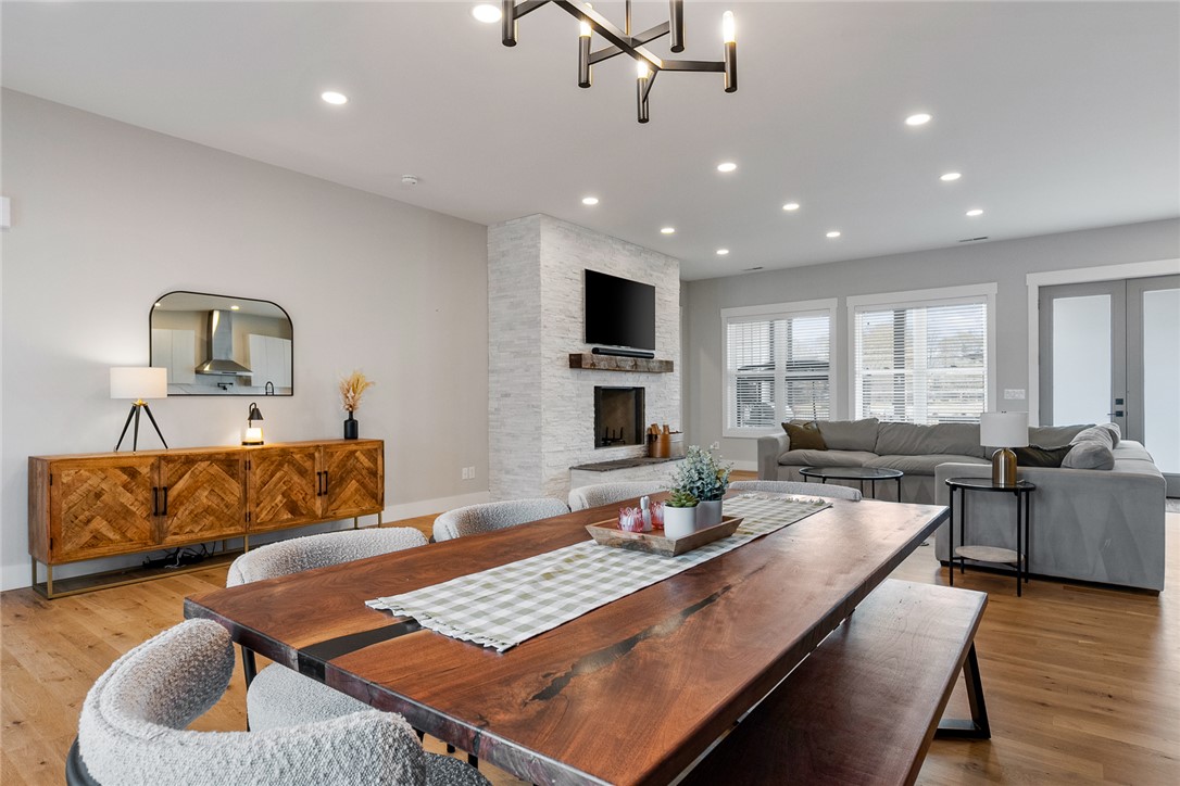 101 Casselberry Court Anderson, SC 29621 - Photo 8 of 48 This bright, open-concept living space features hardwood floors and a modern fireplace.