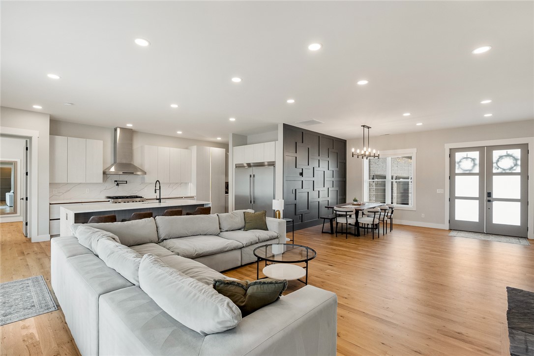 101 Casselberry Court Anderson, SC 29621 - Photo 9 of 48 This open concept living space features a modern kitchen, inviting dining area, and spacious living room.