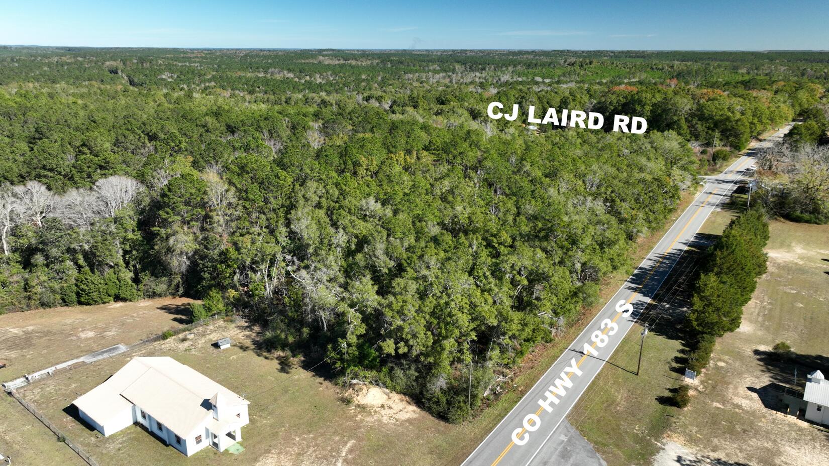 Lot 3 Laird Road DeFuniak Springs, FL 32435 - Photo 4 of 5 a view of a pathway with a park