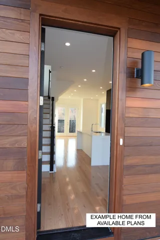 a living room with a couch and a large window