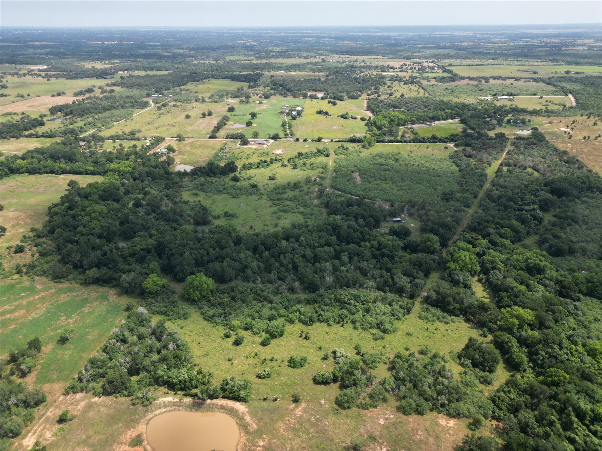 285 Watterson School Road Red Rock, TX 78662 - Photo 8 of 8 Drone / aerial view with a rural view